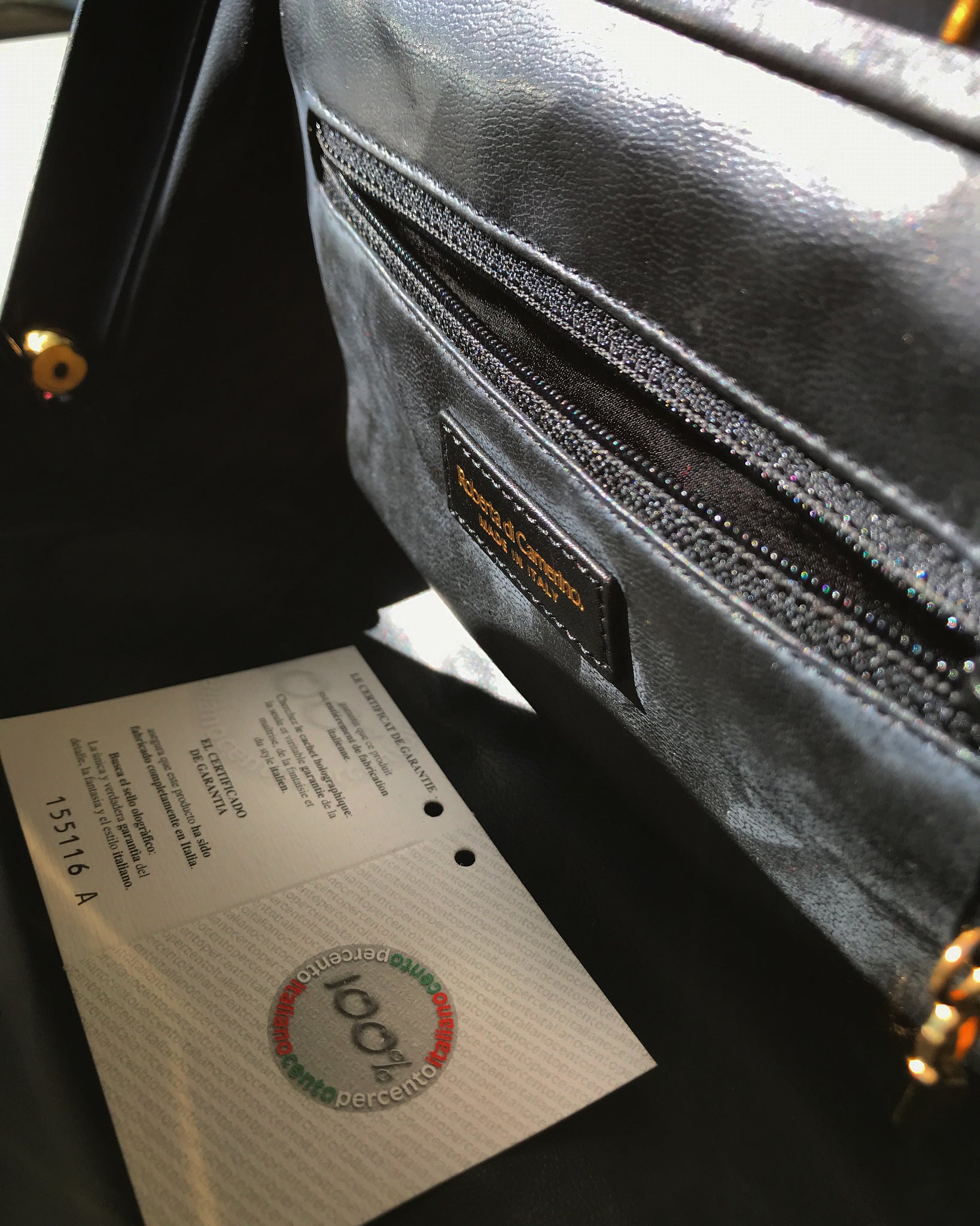 Lush Midnight x Red Velvet Roberta Di Camerino iconic "Bagonghi" bag with gold tone buckles