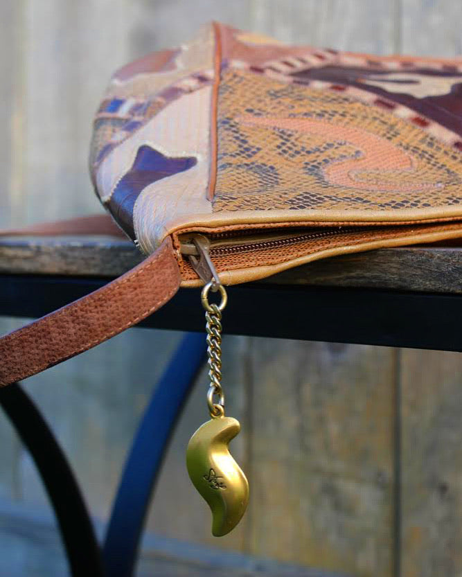 80’s Metallic bronze and cream leather patch work crossbody purse