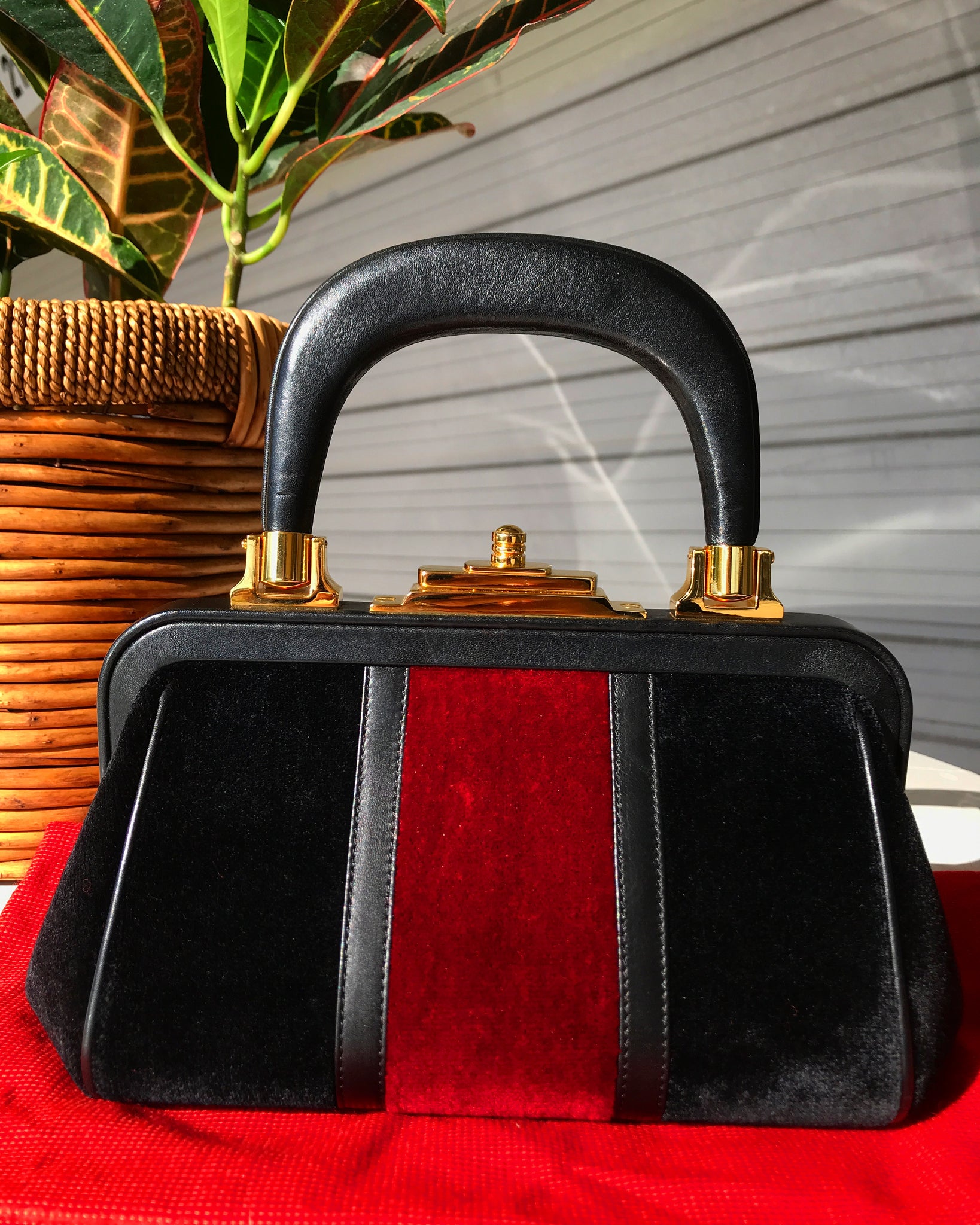 Lush Midnight x Red Velvet Roberta Di Camerino iconic "Bagonghi" bag with gold tone buckles